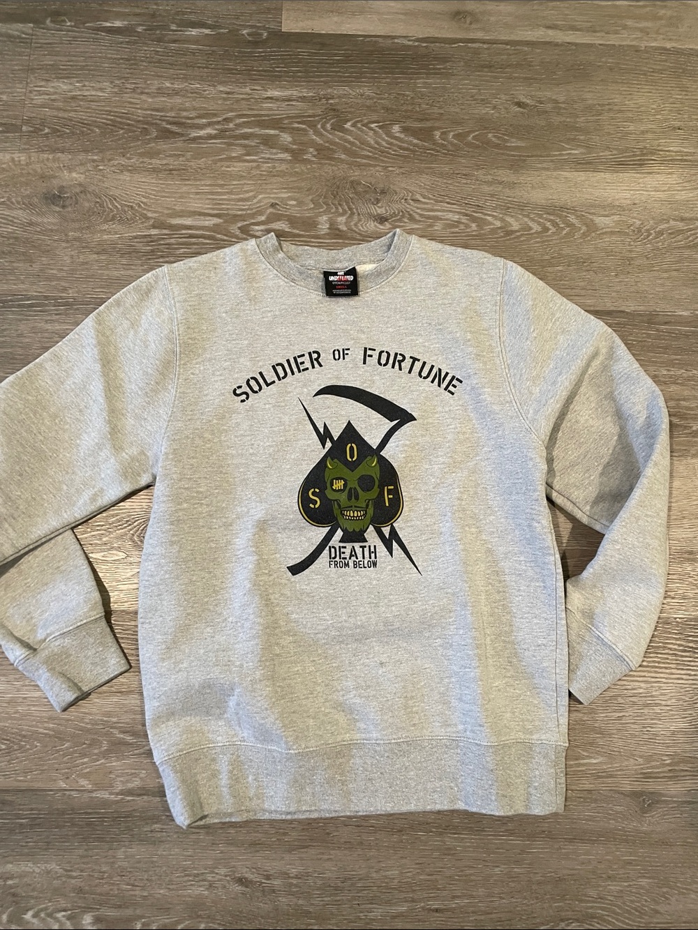 Undefeated Gray Crewneck with Green Skull Graphic